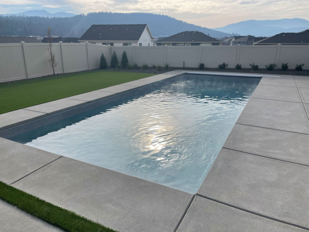 Fiberglass pool installation for Spokane Valley Washington backyard