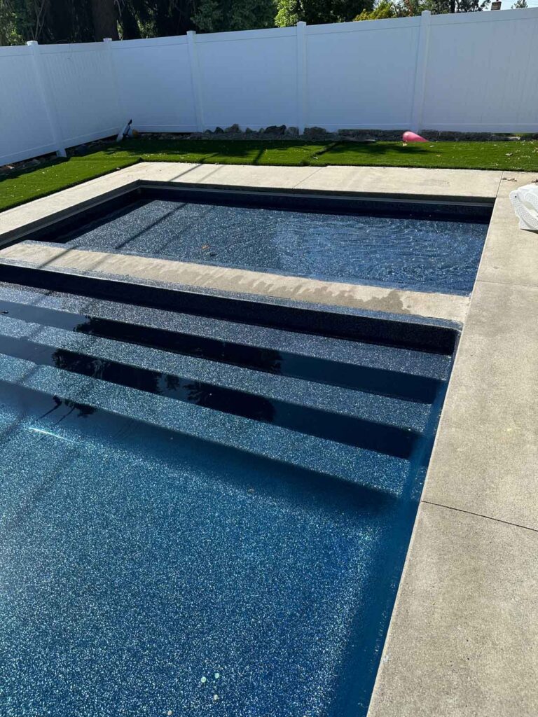 Fiberglass pool with spa option for a Spokane backyard
